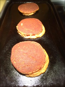 Pumpkin Spice Pancakes flipped on the griddle and ready for a hungry plate!