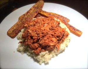 My BBQ pork roast, pulled, atop a bed of fluffy rosemary & garlic cauliflower rice, with a side of baking yellow plantains.